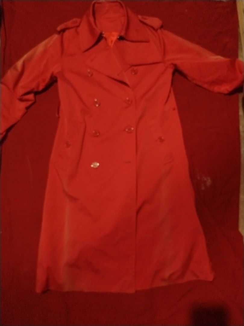 Red Double-Breasted Trench Coat with Epaulets (Category: Coats, Jackets and Outerwear) located in Manila. Submitted by elliot.yuu (Listing ID 1469989556, Image 1). Description: - Color: Vibrant Red - Style: Classic double-breasted trench coat with mid-length cut - Details: Large lapels, shoulder epaulets, and matching front buttons - Season: Ideal outerwear for spring and fall layering - Condition: Clean, solid color finish.