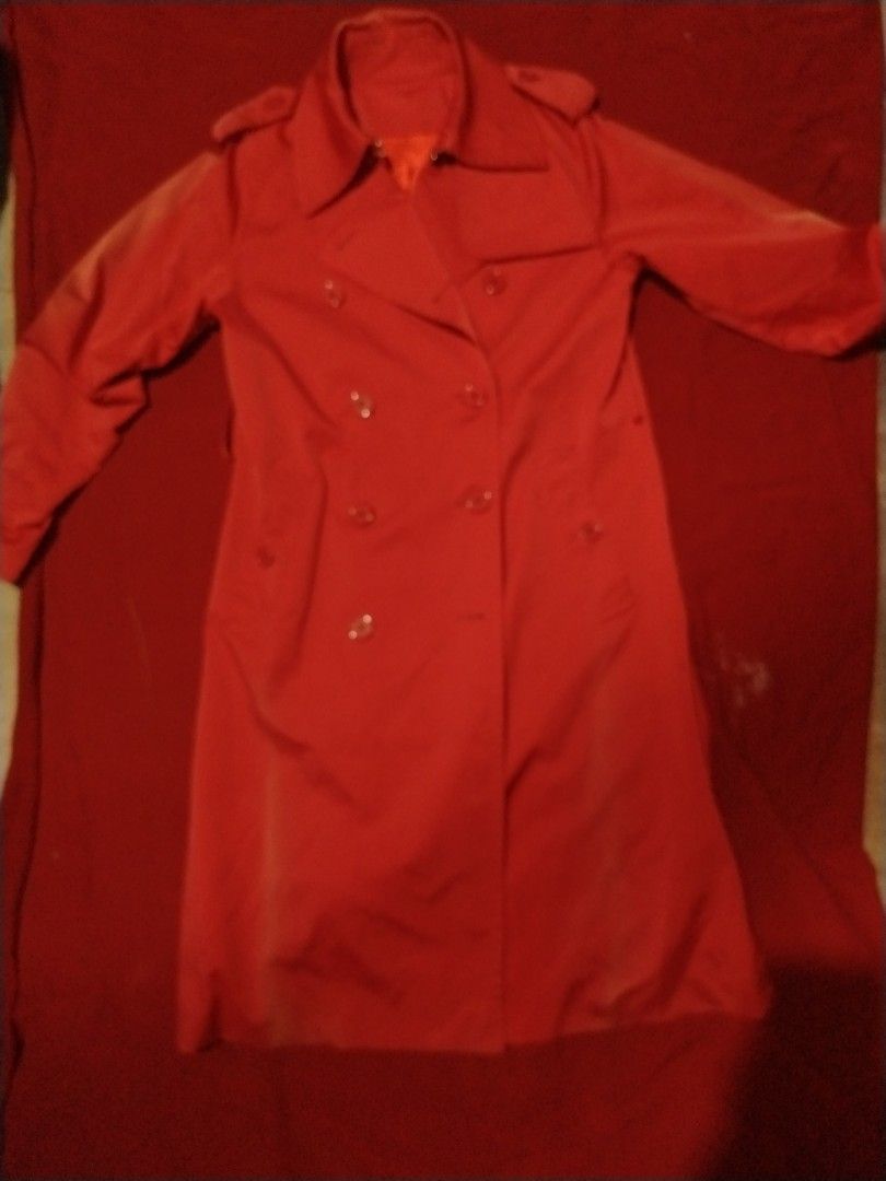 Red Double-Breasted Trench Coat with Epaulets (Category: Coats, Jackets and Outerwear) located in Manila. Submitted by elliot.yuu (Listing ID 1469989556, Image 2). Description: - Color: Vibrant Red - Style: Classic double-breasted trench coat with mid-length cut - Details: Large lapels, shoulder epaulets, and matching front buttons - Season: Ideal outerwear for spring and fall layering - Condition: Clean, solid color finish.