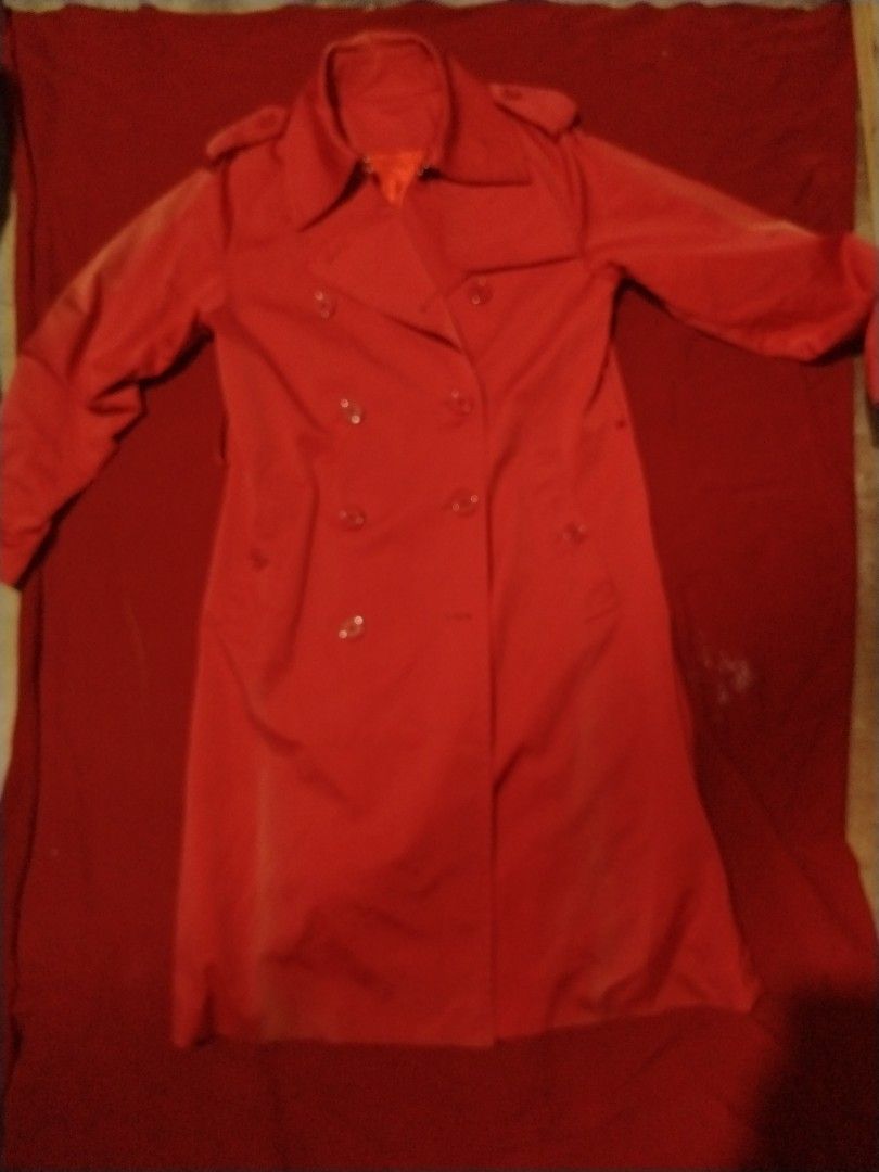 Red Double-Breasted Trench Coat with Epaulets (Category: Coats, Jackets and Outerwear) located in Manila. Submitted by elliot.yuu (Listing ID 1469989556, Image 3). Description: - Color: Vibrant Red - Style: Classic double-breasted trench coat with mid-length cut - Details: Large lapels, shoulder epaulets, and matching front buttons - Season: Ideal outerwear for spring and fall layering - Condition: Clean, solid color finish.