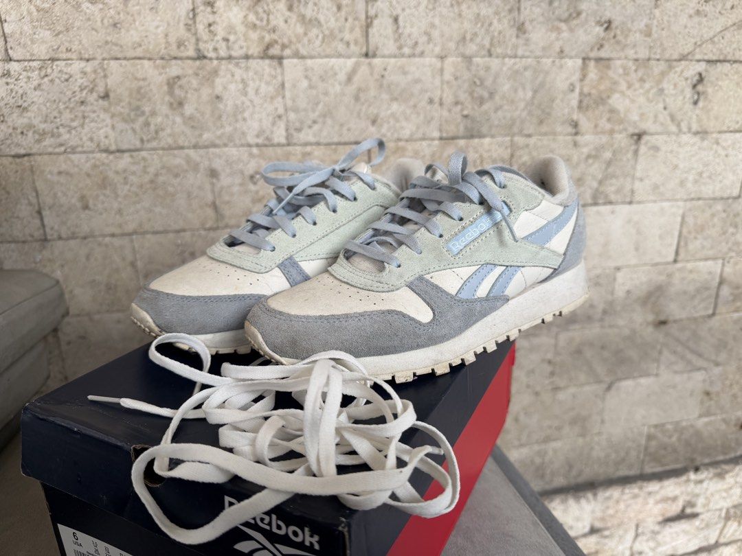 Reebok Classic Leather Women Running (Category: Sneakers) located in Baybay. Submitted by fmikeyela (Listing ID 1470053944, Image 2). Description: - Brand: Reebok Classic Leather - Colorway: Chalk/Palblu/Vinbl (Neutral tones with light blue accents) - Size: Women's US 6 / EUR 36 / UK 3.5 / 23 CM - Material: Suede and leather upper - Condition: Well used. Used for work only. Still in good condition. Soles aren’t worn out. - Inclusions: Original bo