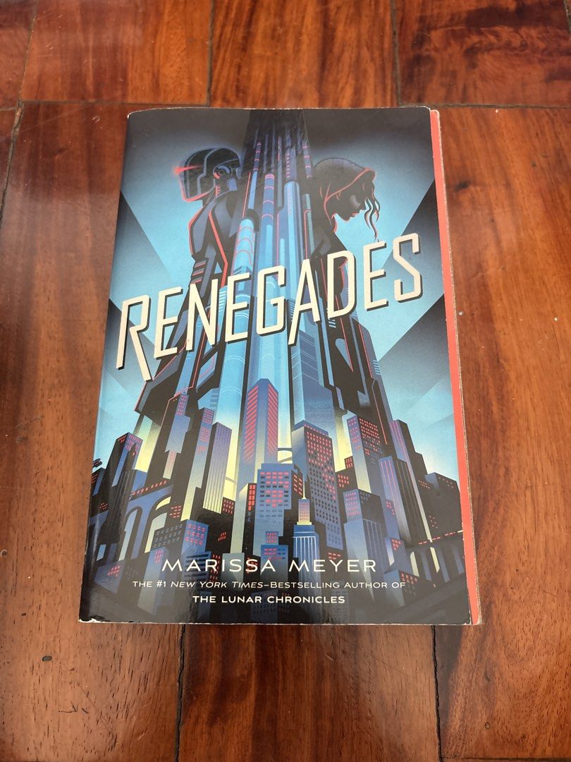 Renegades by Marissa Meyer Paperback Novel (Category: Storybooks) located in Makati City. Submitted by garagesllr007 (Listing ID 1469982238, Image 1). Description: - Title: Renegades - Author: Marissa Meyer (Bestselling author of The Lunar Chronicles) - Genre: Young Adult Sci-Fi / Fantasy - Format: Paperback with urban futuristic cover design - Condition: Pages are clean and intact; minor shelf wear on spine corners and edges - Perfect read for Y