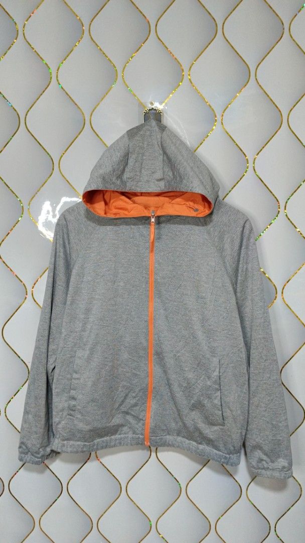 Reversible Hooded Jacket Orange and Grey (Category: Coats, Jackets and Outerwear) located in Manila. Submitted by zariyah.1986 (Listing ID 1470068853, Image 3). Description: - Style: 2-in-1 Reversible Hooded Jacket - Colors: Bright Orange (side 1) / Grey Jersey Fabric (side 2) - Closure: Full zip with matching orange zipper tape - Pockets: Functional side pockets on both reversible sides - Comfort & Fit: Attached hood, long sleeves, with elastici