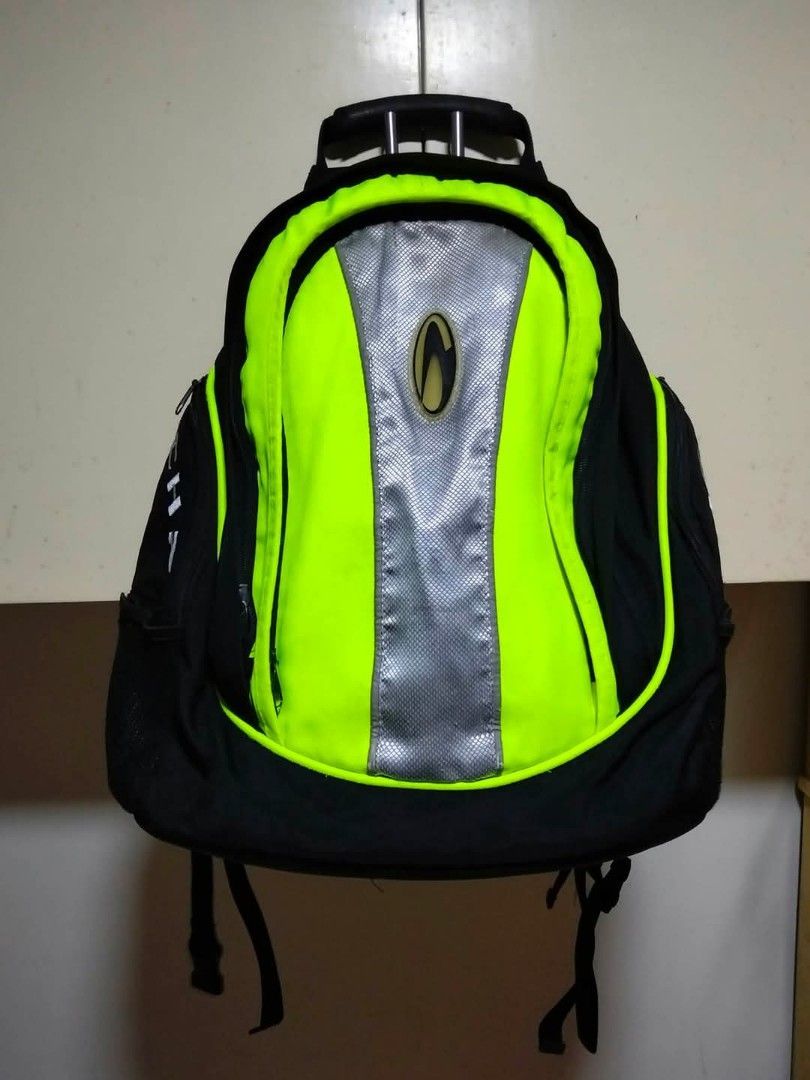 Richa Black and Neon Green Backpack (Category: Backpacks) located in Mangaldan. Submitted by niftythrifty69 (Listing ID 1470053654, Image 1). Description: - Brand: Richa - Color: Black with bright neon green panels and reflective silver strip - Storage: Good capacity with multiple internal compartments and organizer slots - Pockets: Convenient mesh side pockets - Comfort: Adjustable shoulder straps and sturdy top handle - Ideal for: Daily commute