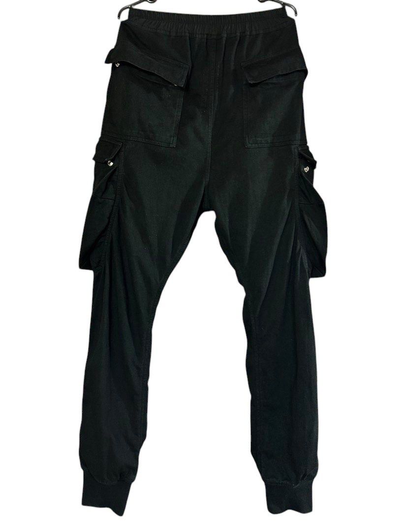Rick Owens MAINLINE S/S19BABEL Cargo Jogger Pants (Category: Joggers) located in Cagayan de Oro. Submitted by oracle_archives (Listing ID 1470118076, Image 2). Description: Rick Owens MAINLINE SS19 “BABEL” Cargo Jogger Pants Authentic W:30”-36” L:40” Rise:12” Inseam:28” Thigh:11” Knee:7.5” Leg opening:4.5”.