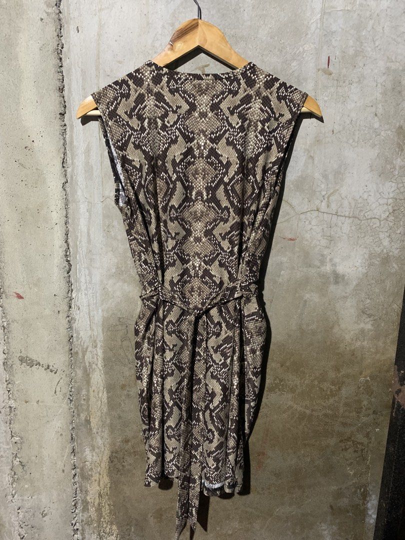 Rinascimento snake skin (Category: Dresses) located in Manila. Submitted by zthriftyyy (Listing ID 1470047148, Image 2). Description: Rinascimento Snake Print Self-Tie Dress | Size S Authentic Rinascimento from Italy 🇮🇹 Perfect for night out, date, or elegant events. DETAILS: • Size: S on tag | Best fits S-M Women’s • Color: Taupe/Brown Snake Print • Cut: Deep V, Draped front, Self-tie waist, Midi length • Material: Soft, comfy, and flowy • Sty