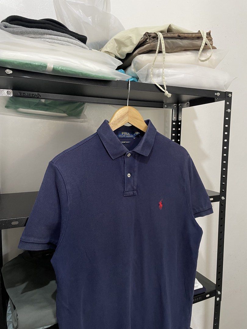 RL navy polo shirt (Category: Tshirts & Polo Shirts ) located in Cavite. Submitted by arvinroderos (Listing ID 1469949450, Image 2). Description: RL navy polo shirt 21x28 8.5 color rate hole sa may batok hindi na nakikita halos 300.
