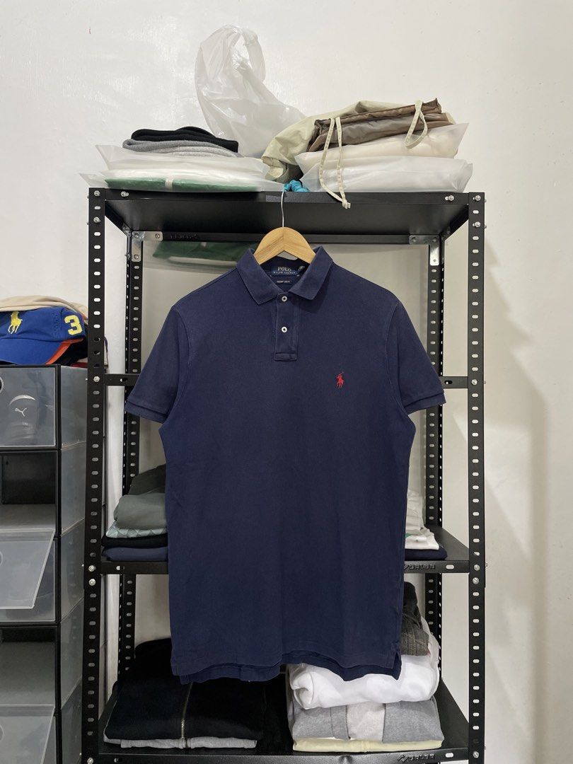 RL navy polo shirt (Category: Tshirts & Polo Shirts ) located in Cavite. Submitted by arvinroderos (Listing ID 1469949450, Image 1). Description: RL navy polo shirt 21x28 8.5 color rate hole sa may batok hindi na nakikita halos 300.