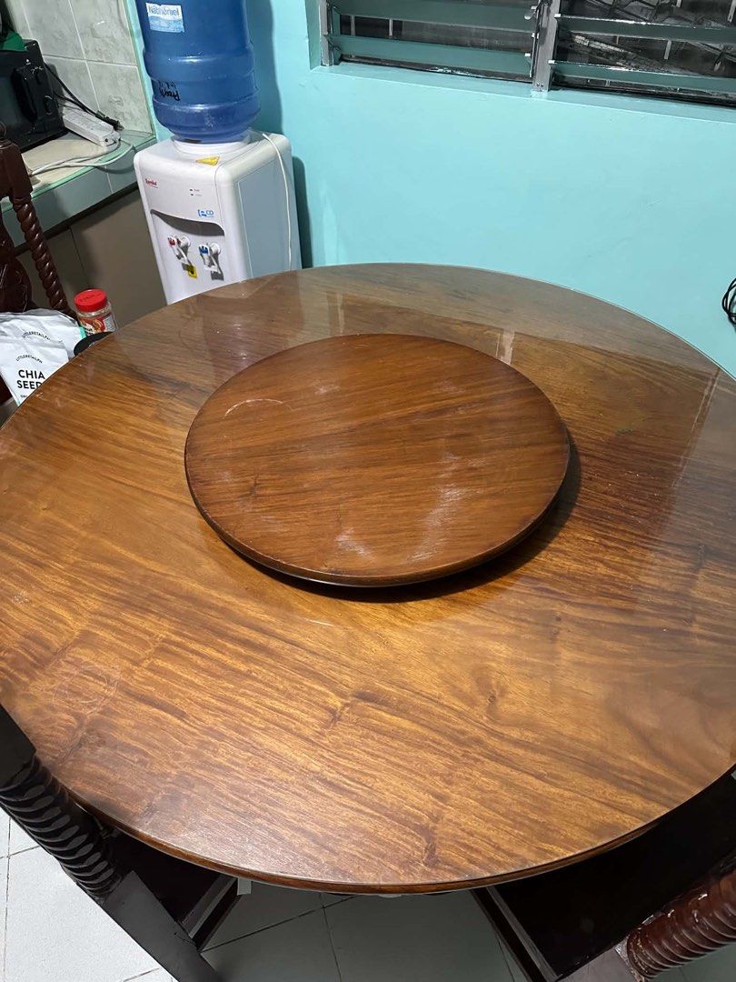 Round dining table with chairs and lazy susan (Category: Tables & Sets) located in Marilao. Submitted by thxl.15 (Listing ID 1470074100, Image 2). Description: 🛒 wooden round table w/ center turntable (lazy susan) — with 4 chairs — carved design — thick glass protector ₱ 45k , negotiable 📍 valenzuela t. Solid wood round dining family table matching chairs narra dense timber traditional Filipino carved details classic dark wood finish heavy narr