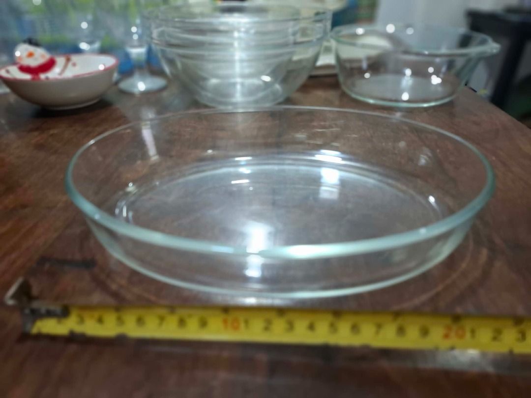 Round Shallow Glass Dish (Category: Bakeware) located in Pasig City. Submitted by dripcounty (Listing ID 1470024693, Image 1). Description: Round Shallow Glass Dish ₱150 Bought in the Philippines Condition: Good / preloved Round shallow clear glass dish. Brand and capacity unconfirmed. See measurement photo. Actual item shown in photos. Delivery fee shouldered by buyer (Lalamove / other courier). Item price excludes delivery. Payment via cash / G