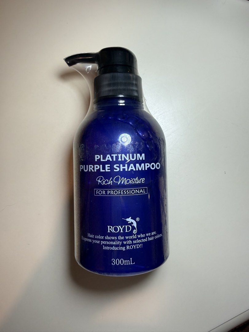 ROYD Platinum Purple Shampoo Rich Moisture 300ml (Category: Hair) located in Quezon City. Submitted by d.othersetc (Listing ID 1470102702, Image 1). Description: - Brand: ROYD Platinum Purple Shampoo (Made in Japan) - Condition: Brand new, unused, and sealed in original plastic wrapping - Volume: 300ml - Benefits: Prevents yellowing after bleaching, rich moisture formula keeps hair smooth and conditioned - Scent: Fresh floral fruity.
