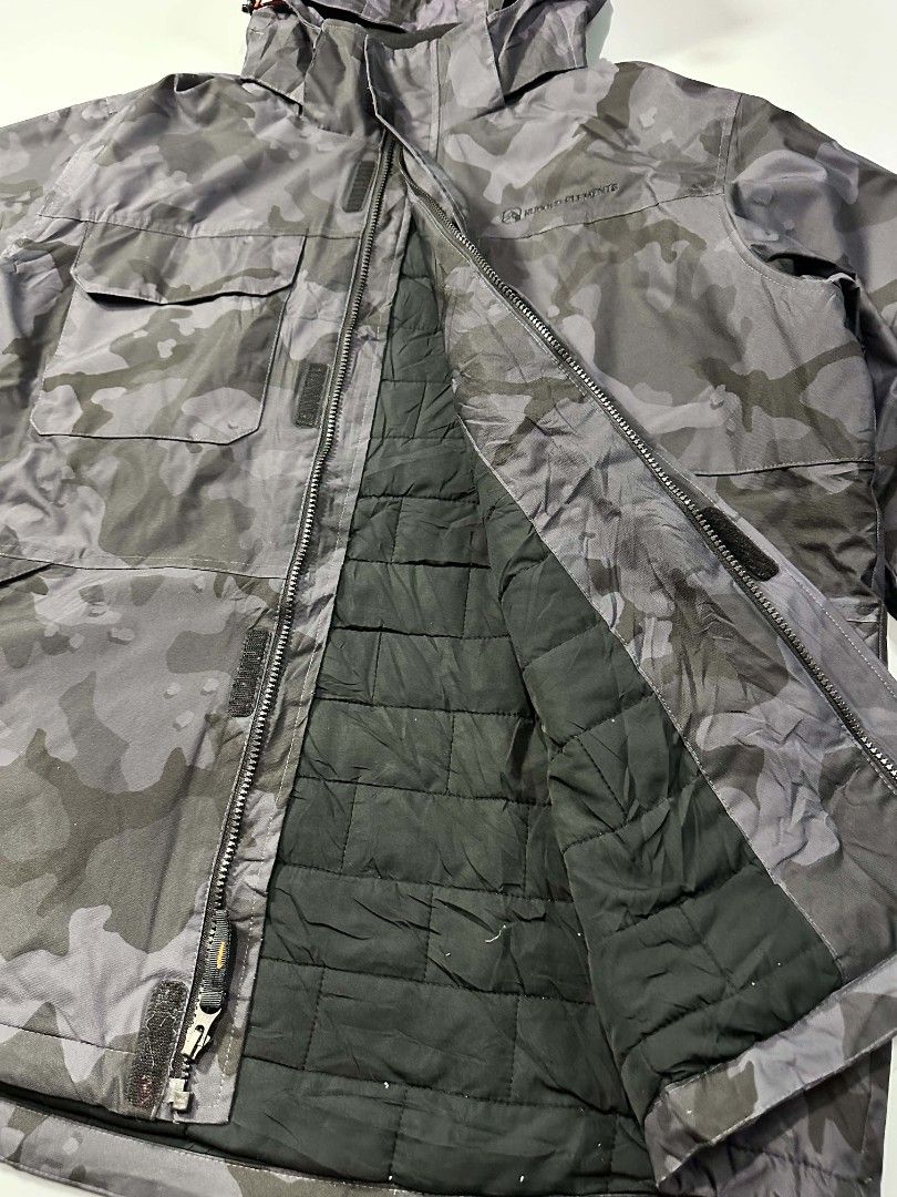 Rugged Elements Camouflage Hooded Winter Jacket XL (Category: Coats, Jackets and Outerwear) located in Manila. Submitted by whoego (Listing ID 1470123416, Image 3). Description: - Brand: Rugged Elements Dimes: Length: 29 inches Width: 26 inches Shoulders: 20.5 inches Sleeves: 26.5 inches - Style: Winter jacket in grey camouflage pattern - Size: XL - Warmth: Quilted inner lining for extra cold protection - Hood: Attached hood with adjustable draws