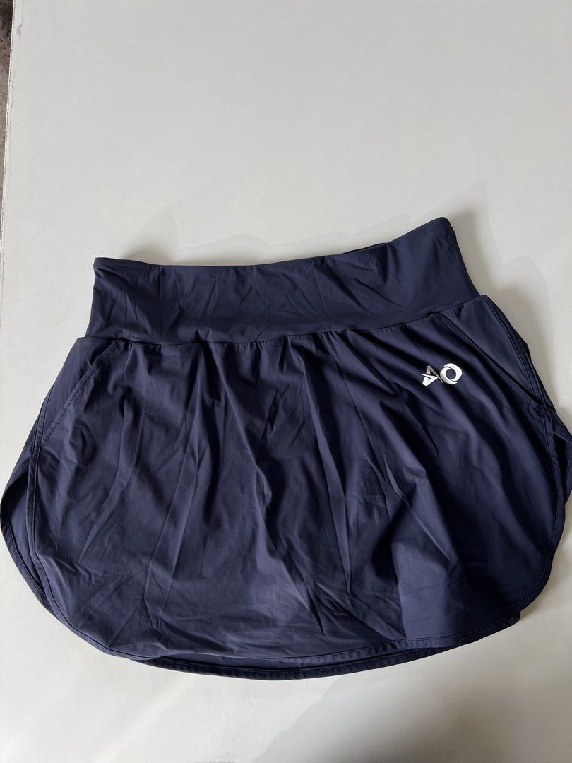 Running Skort (Category: Activewear) located in Santiago. Submitted by ricevllnz (Listing ID 1469956780, Image 1). Description: Sporty and practical skort that combines the look of a skirt with the comfort of athletic wear! • Brand: ActiveOneWear • Size: XL (Asian sizing) but can fit med to large • Color: Navy blue • Style: Athletic skort • Design: Wide waistband with curved hem • Features: Built-in shorts underneath • Lightweight, smooth athleti