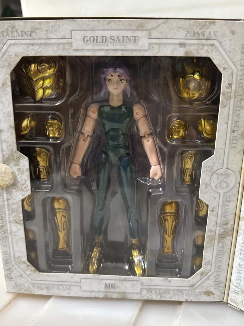 Rush Sale Saint Cloth Myth - Leo (Category: Character Goods) located in Manila. Submitted by lokeyseller (Listing ID 1469955699, Image 1). Description: Original box/packaging • Box shows heavy signs of age and storage wear • Visible creases, scratches, scuffs and discoloration on the box • Some edge/corner wear and separation/splitting on the cardboard • Original tape is present and has aged over time • Window/blister packaging is still intact • 