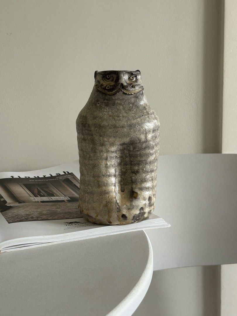 Rustic Owl Ceramic Vase (Category: Vases & Decorative Bowls) located in Quezon City. Submitted by curatedfindsy (Listing ID 1469991341, Image 1). Description: Rustic Owl Ceramic Vase - One-of-a-Kind Statement Piece ₱420 Dimension: 17cm h x 10cm d Quality: Excellent This unique handcrafted stoneware vase features a beautifully sculpted owl face and a rustic, earthy finish. Beautiful as a standalone decorative piece or a collectible ceramic vessel.