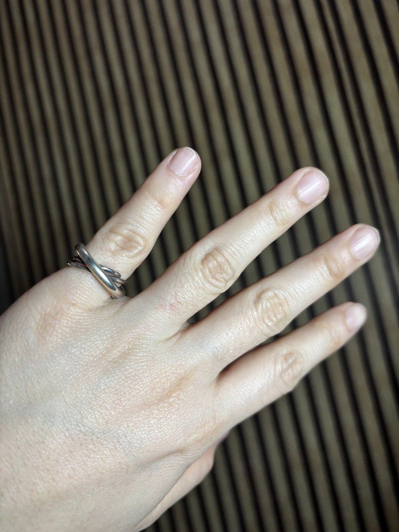 S925 stamped Silver Multi-Band Cross Ring Open Design Size Adjustable (Category: Rings) located in Caloocan City. Submitted by berndale_closet (Listing ID 1470006338, Image 3). Description: - Material: S925 Silver (stamped on inner band) but not tested - Design: Elegant multi-band crossing style - Fit: Open adjustable size to fit most fingers - Finish: Clean, highly polished, no tarnishing - Comfort: Lightweight and perfect for daily wear - Styli