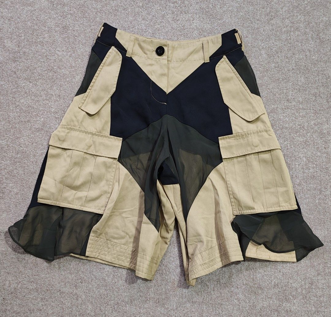Sacai patchwork shorts (Category: Shorts) located in Apalit. Submitted by _doer (Listing ID 1469970059, Image 1). Description: size 30 23 inches length flaw loose stitch see last pic 3500 or best offer.