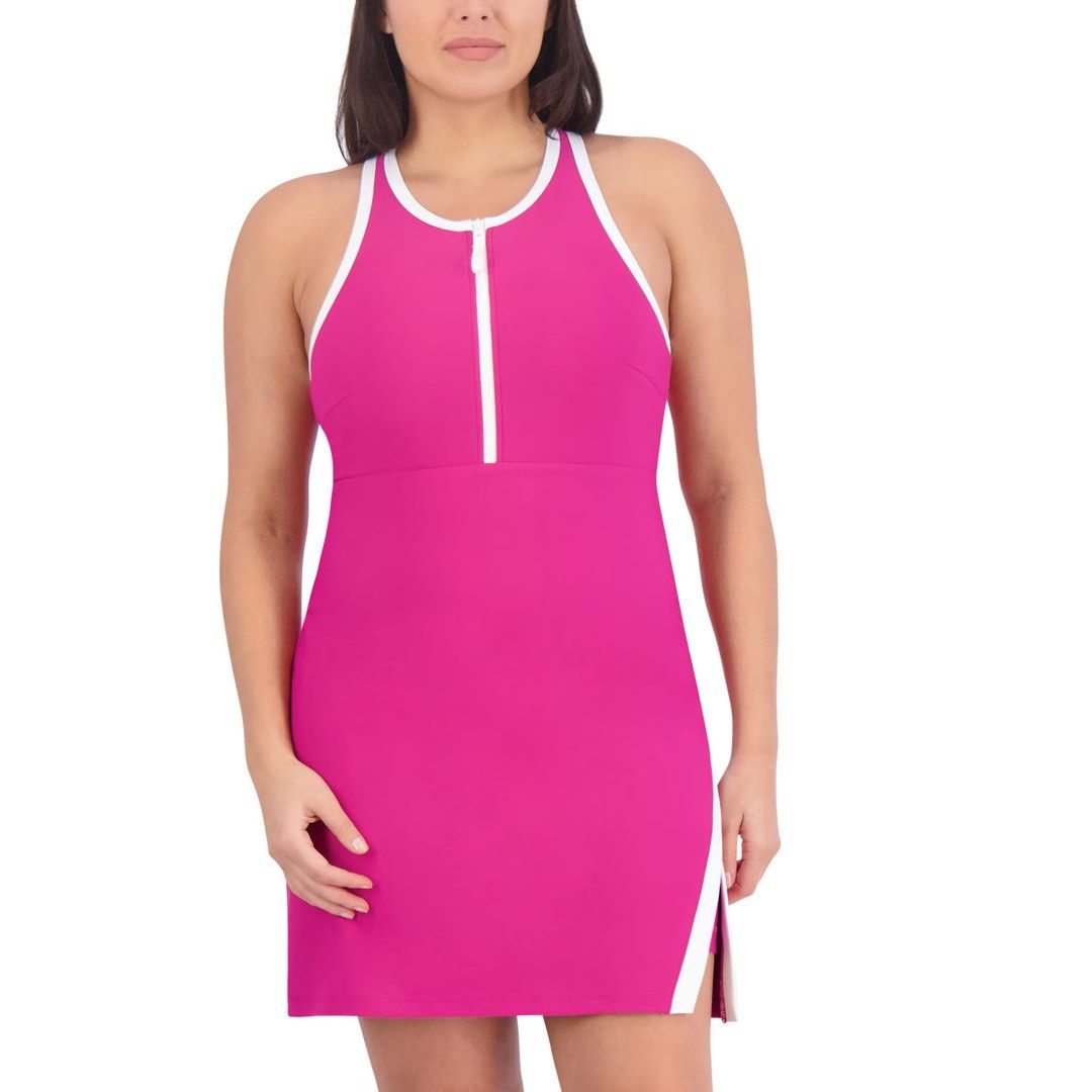 Sage Collective Zip Front Active Dress Pink Small (Category: Dresses) located in Manila. Submitted by lorainelouise (Listing ID 1470035546, Image 2). Description: - Brand: Sage Collective - Size: Small - Color: Bright pink with white trim - Design: Half-zip front, sleeveless racerback, and side split - Feature: Built-in shorts for extra coverage - Material: Smooth, comfortable athletic fabric - Condition: Excellent.