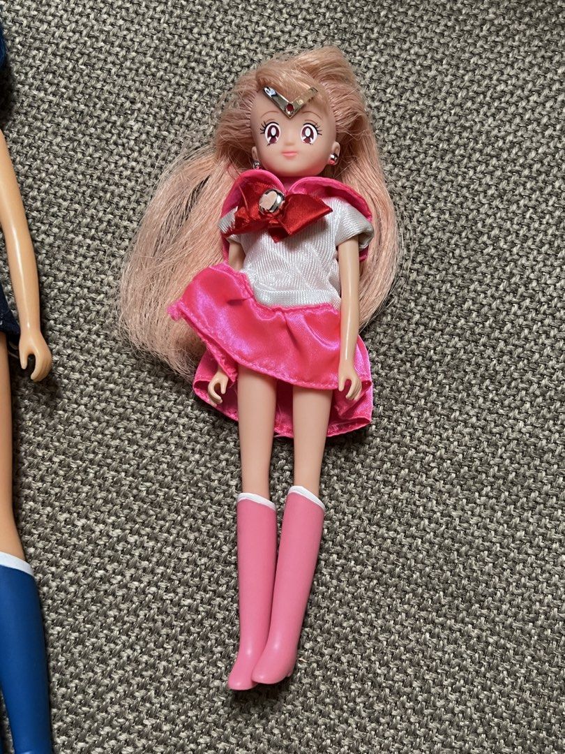 Sailor Moon Chibi Chibi Fashion Doll (Category: Figurines & Statues) located in Guiguinto. Submitted by ambershelb75728 (Listing ID 1469997233, Image 1). Description: - Character: Sailor Moon Chibi Chibi fashion doll - Appearance: Pink hair, white top, pink skirt, red front bow, pink boots, and forehead tiara - Condition: Clean and intact face print; hair needs some brushing out - Note: Great addition for collectors - Location: Ships from Philipp
