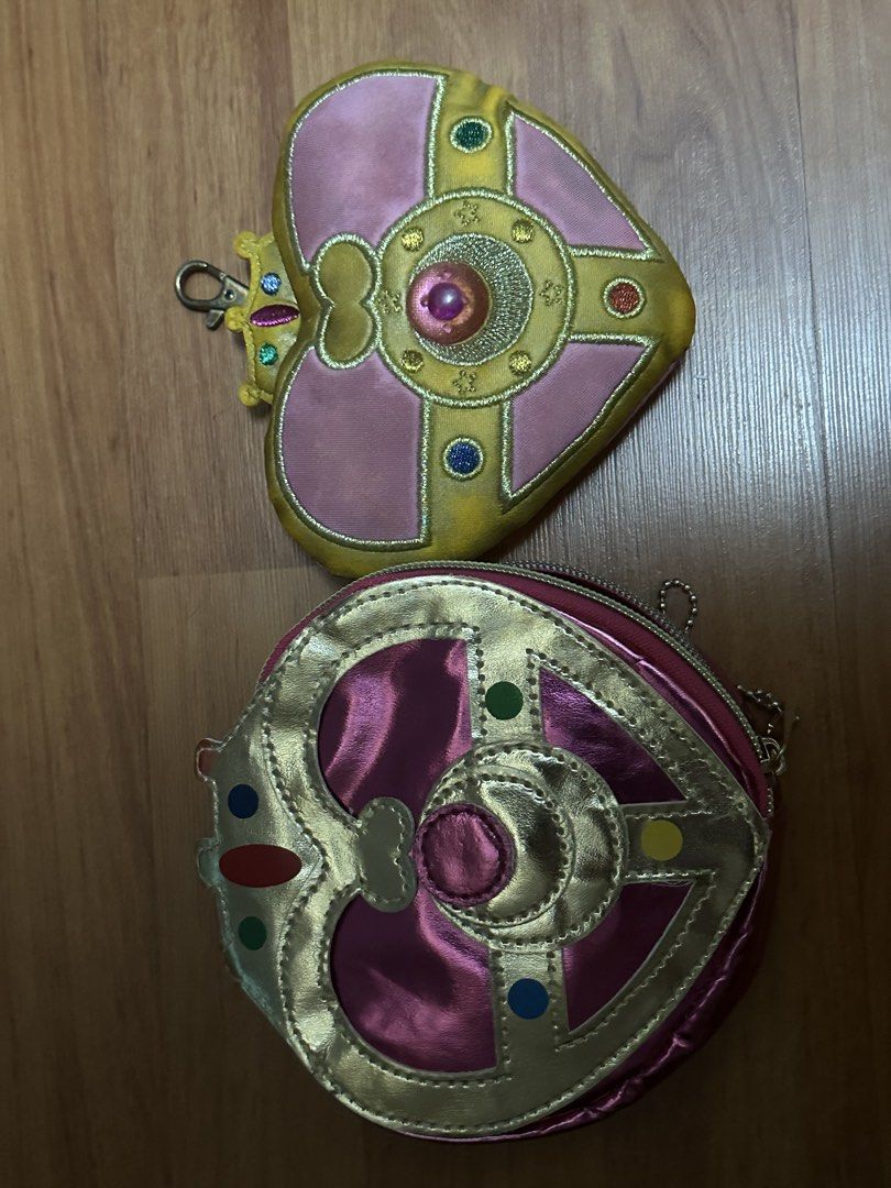 Sailor Moon figures, purses, camera, and star fan bundle (Category: Figurines & Statues) located in Del Monte. Submitted by valin. (Listing ID 1469979399, Image 1). Description: - Massive Sailor Moon collection for fans and collectors - Includes mini chibi figures with stands (Sailor Moon, Mercury, Mars, Venus, Jupiter, and Chibi Moon) - Comes with 2 cute heart pouches - Includes a pink toy camera decorated with stickers - Features a star-shaped 