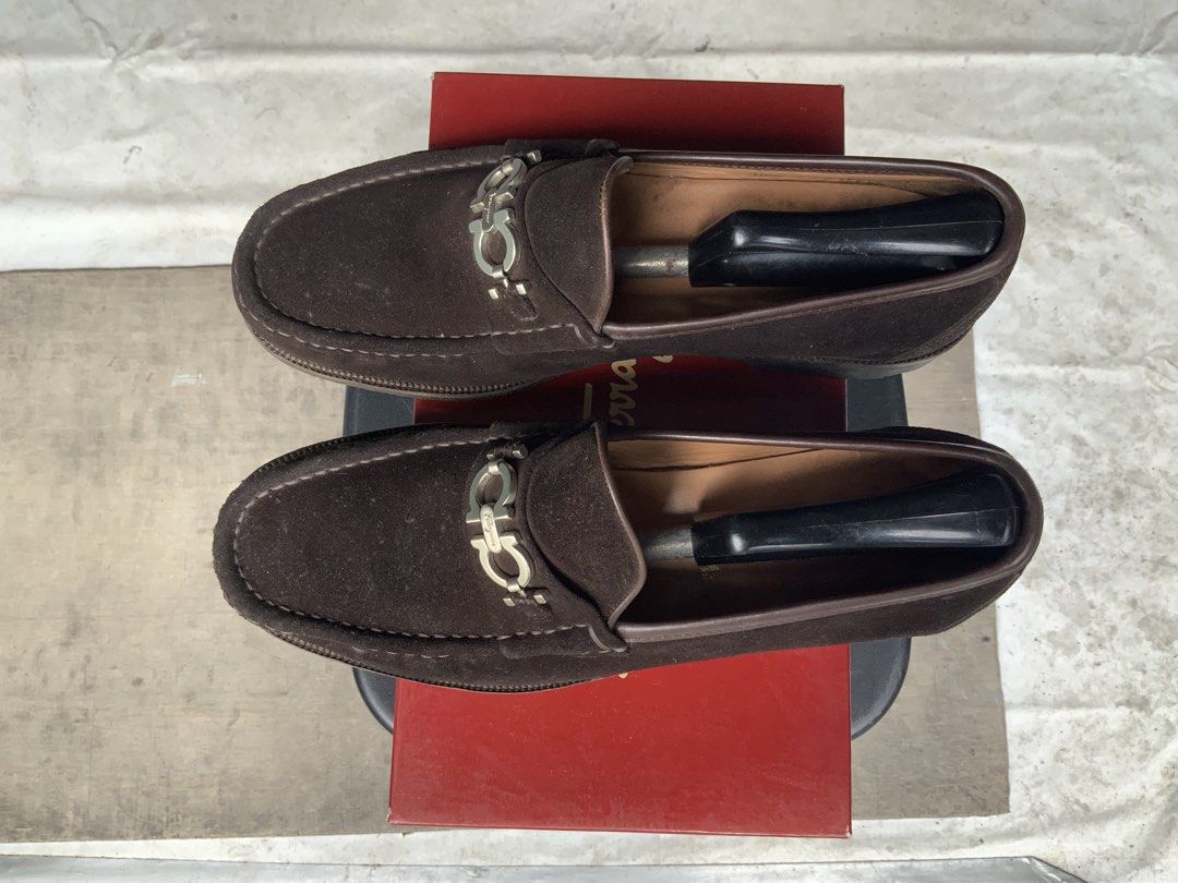 Salvatore Ferragamo Suede Loafers (Category: Dress Shoes) located in Makati City. Submitted by imagineinc. (Listing ID 1469986494, Image 2). Description: - Salvatore Ferragamo - Purchased in the USA , 2002 - Model: Geneva 2 Loafers - Chocolate Brown Suede - Size 10 EE (Made in Italy) - Rich calf suede upper with tonal piping with Silver-tone Gancini hardware - Sturdy rubber lug soles - Clean insoles, minimal wear on treads - Includes Original red