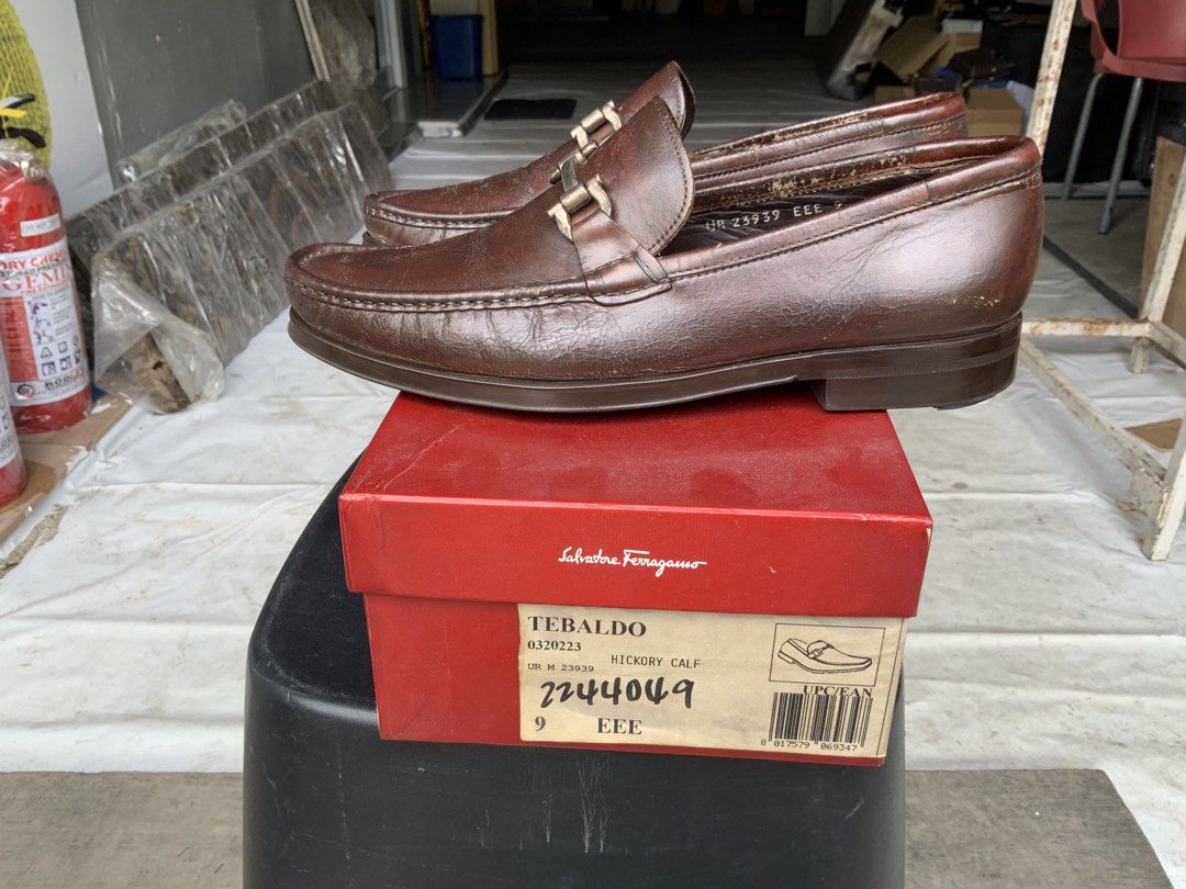 Salvatore Ferragamo Loafers (Category: Dress Shoes) located in Makati City. Submitted by imagineinc. (Listing ID 1469989131, Image 3). Description: - Salvatore Ferragamo - Model Tebaldo Loafers - Purchased in 2004 - Hickory calf leather in rich brown - Classic slip-on with silver-tone bit buckle - Stored for so long shows natural creasing of leather material - Original red Ferragamo shoe box.