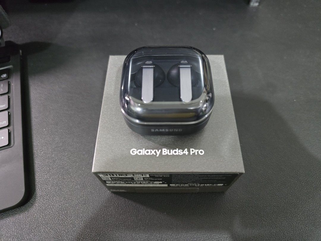 Samsung Galaxy Buds4 Pro wireless earbuds (Category: Earphones) located in Quezon City. Submitted by matteob (Listing ID 1470071612, Image 1). Description: Bought from samsung store August 2026 RFS: Need Cash. Samsung Galaxy Buds4 Pro wireless earbuds in black. Original retail box included. Charging case and earbuds displayed clearly. Clean finish with metallic accents on the stems..