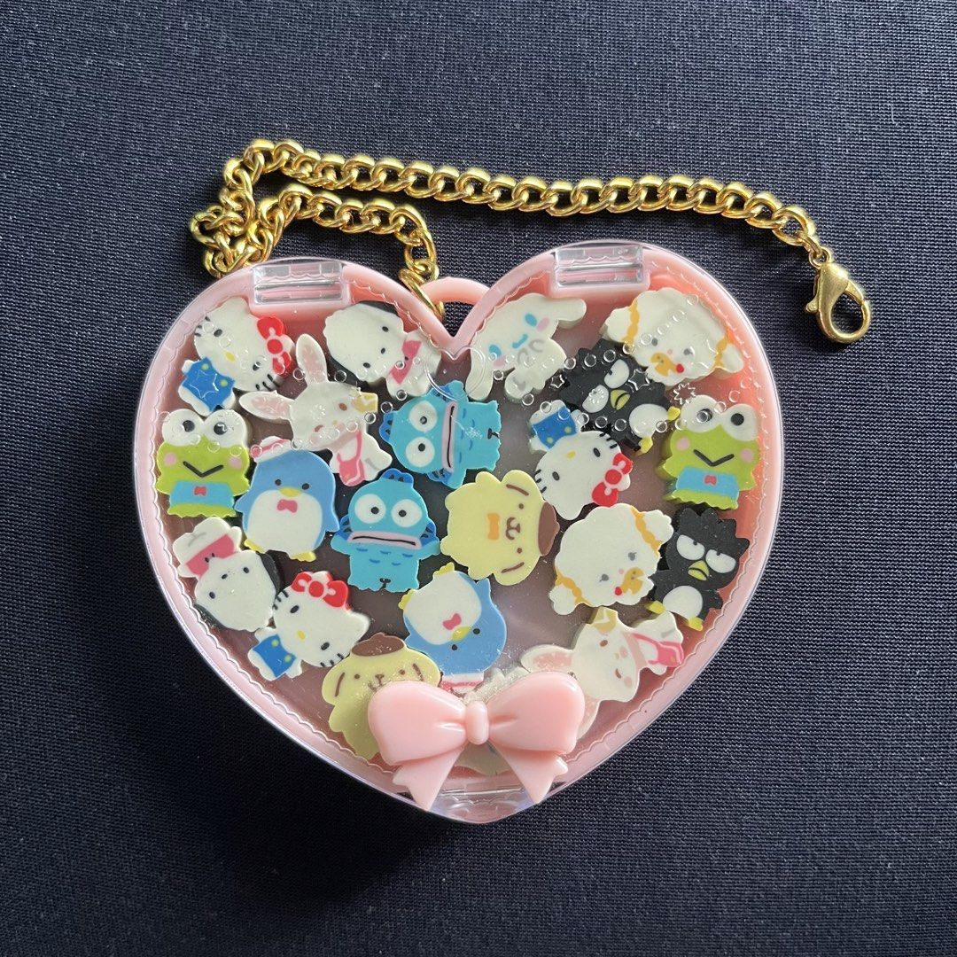 Sanrio Characters Eraser Charm (Category: Character Goods) located in Marikina City. Submitted by anythindahan (Listing ID 1469977088, Image 1). Description: Sanrio characters eraser in heart-shaped box with keychain Original and bnew from Sanrio Puroland, Japan BDO or BPI Pick up location: Concepcion Dos, Marikina City Buyer to book shipping.