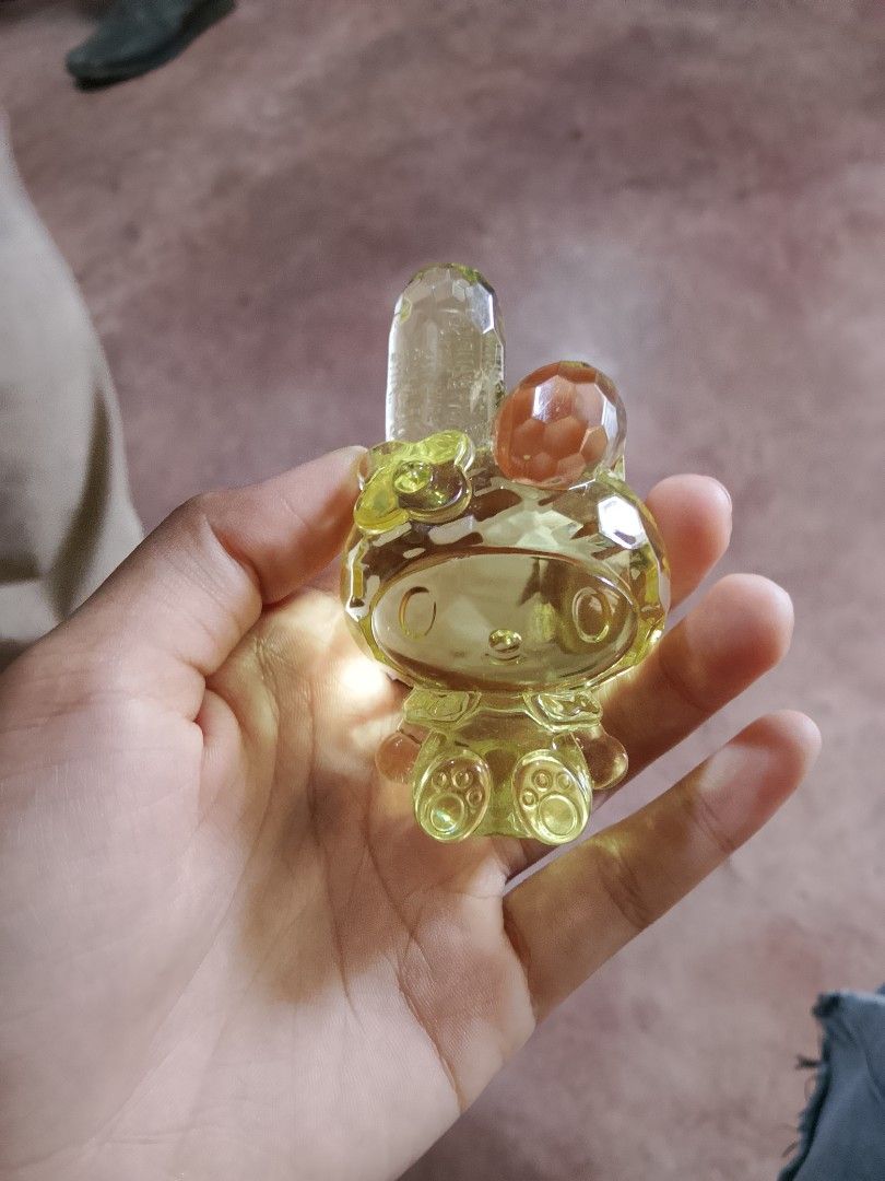 Sanrio Clear Crystal Acrylic Figurines Set (Category: Designer & Blind Box Toys) located in Abucay. Submitted by yanies_closet (Listing ID 1470082180, Image 3). Description: - Set of 3 faceted crystal acrylic character figurines - Includes yellow My Melody, purple frog, and pink figure in a dress - Catches the light beautifully when placed near a window - Perfect shelf decor and a must-have for Sanrio fans - Selling all three pieces together as a