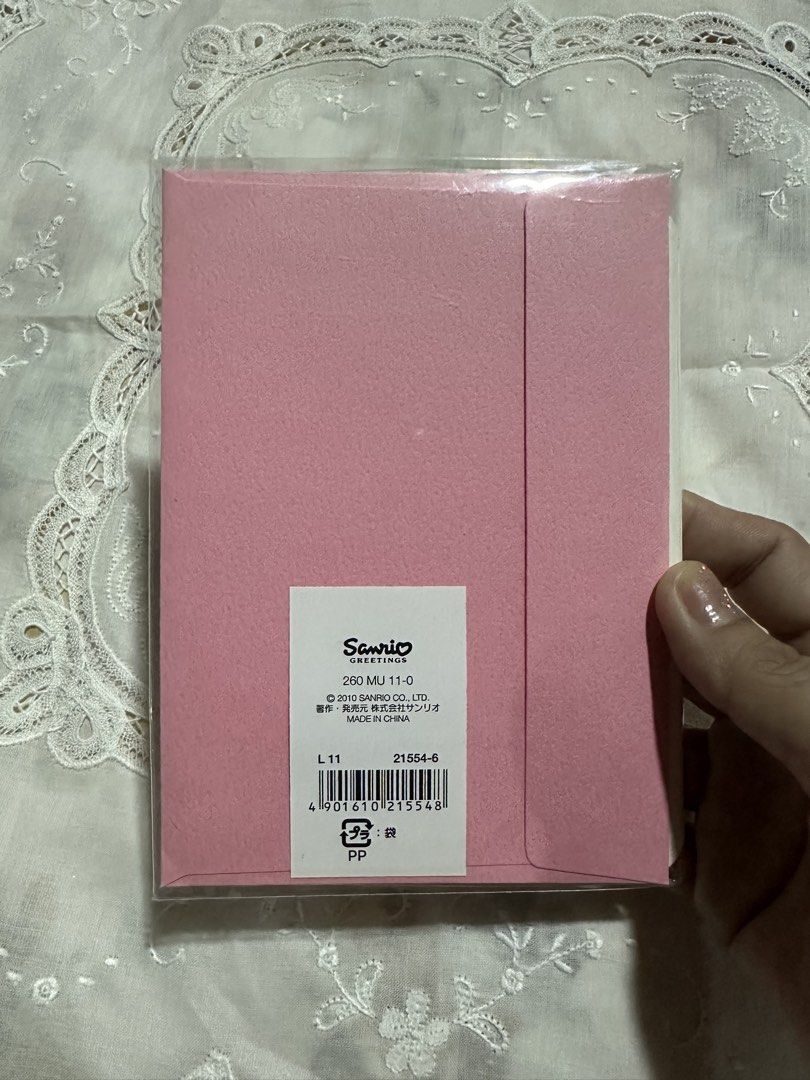 Sanrio multi-purpose greeting card (Category: Vintage Collectibles) located in Davao. Submitted by favoritepreloved (Listing ID 1470120534, Image 3). Description: 💜 featuring a pink and white floral pattern with the text "For You" in the center .
