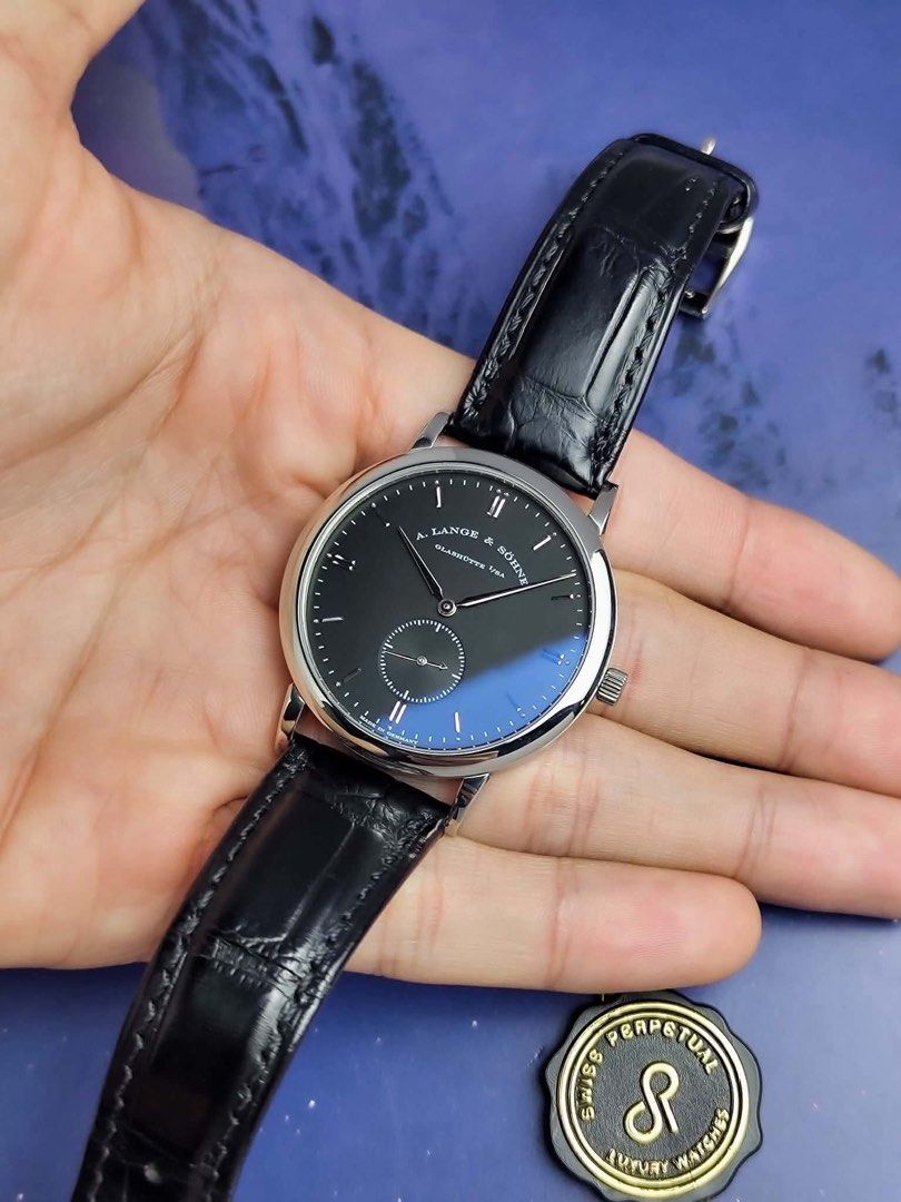 Saxonia Small Seconds Black Dial WG (Category: Men's Watches) located in Makati City. Submitted by swissperpetual (Listing ID 1470019133, Image 2). Description: A. Lange & Söhne Saxonia Small Seconds White Gold Black Dial 215.029 37mm 2010 Complete Set Condition: 9/10 (Excellent condition) Price: P1,248,000 Negotiable 🤝 7 Day Moneyback Guarantee 🧑‍🔧 1 Year SP Service Warranty 💱 Trades Offers and Pre-orders Accepted 💳 Credit Card Options Avai