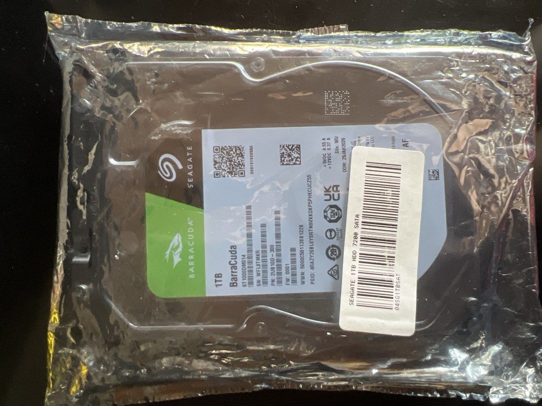 Seagate BarraCuda 1TB SATA Hard Drive (Category: Hard Disks & Thumbdrives) located in Manila. Submitted by youngowl.105bae (Listing ID 1469996472, Image 1). Description: - Brand new and sealed in original anti-static packaging - Capacity: 1TB for reliable desktop storage - Speed: 7200 RPM for fast data transfer - Form Factor: Standard 3.5-inch - Interface: SATA - Manufacturing Date: January 29, 2026 - Ideal for new PC builds or storage upgrades.