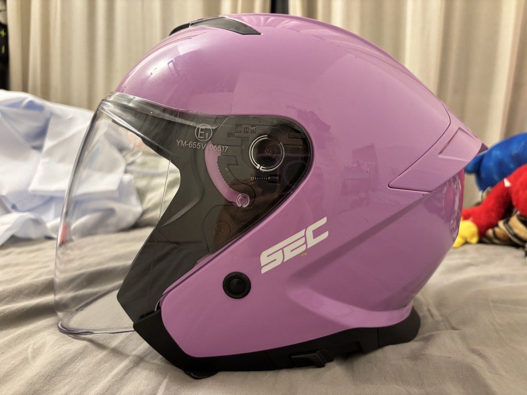 SEC Payon Shell Pink Motorcycle Helmet (Category: Bicycles) located in Pasig City. Submitted by nessbelda0728 (Listing ID 1469963666, Image 2). Description: - Brand/Model: SEC Payon Shell Open Face Helmet - Color: Pink with a clean glossy finish - Size: Medium (57-58cm) - Safety: ECE safety certified - Inclusions: Clear visor - Condition: Good daily commuter condition, minor scuff near the top rear vent.
