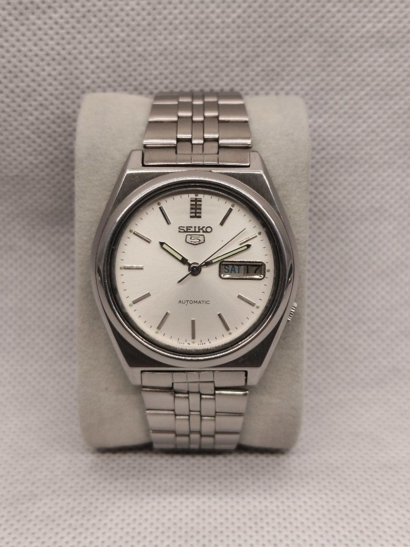 Seiko 5 Automatic, reference 7009-3170 (Category: Men's Watches) located in Pasig City. Submitted by timepiece-and-co (Listing ID 1469947321, Image 1). Description: Movement: Powered by the classic Seiko Caliber 7009, a highly reliable 17-jewel automatic workhorse movement widely produced from the late 1970s through the 1990s. Design Elements: Features an angular stainless steel integrated-style case, a clean white/silver dial, rectangular stick 