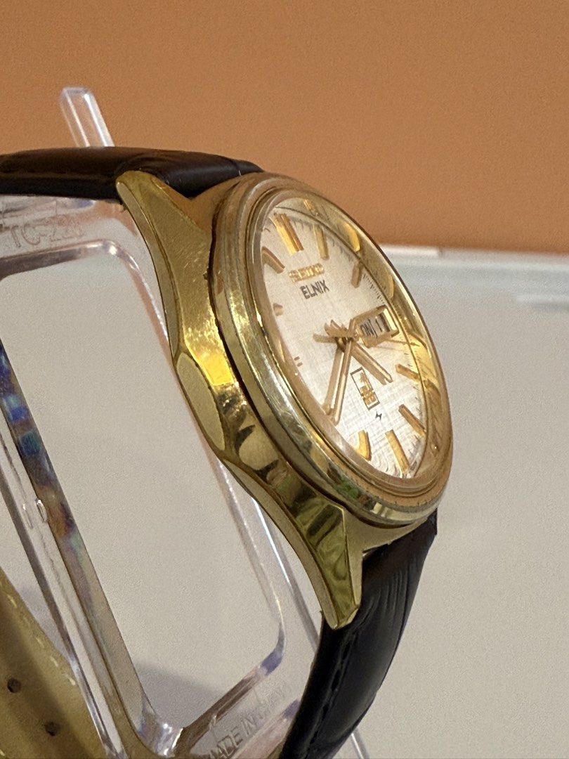 Seiko Elnix Gold Dial Watch (Category: Men's Watches) located in Bacoor. Submitted by michiepeachy (Listing ID 1470130529, Image 3). Description: Movement: electromechanical / transistorized balance Strap: Replaced Issue: None Price: 7,500 Inclusion: Watch only ‼️Please be reminded that this is preloved (second-hand), so it may have minor signs of wear consistent with its age. Kindly review the photos before purchasing.‼️.