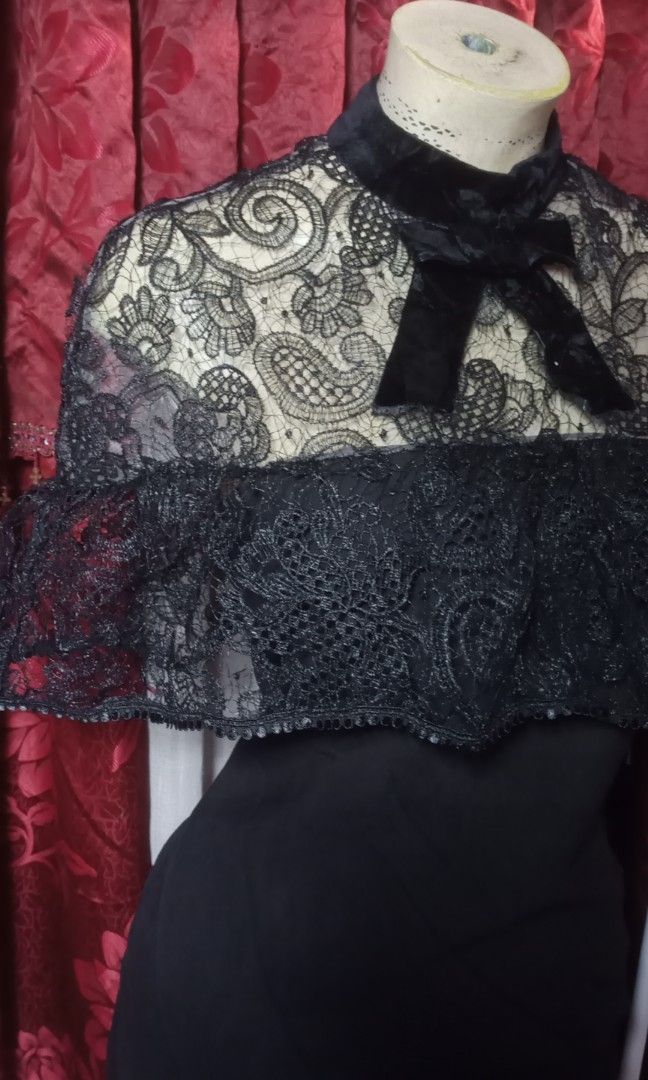 Self-portrait (Category: Dresses) located in Manila. Submitted by wheneity67thifted (Listing ID 1470136688, Image 3). Description: This garment is a black mini dress featuring a sheer lace yoke, a high mock neck, an attached ruffled lace capelet, and a velvet bow accent at the front..