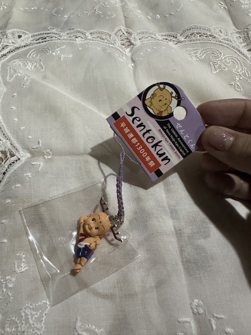 Sentokun (せんとくん) figure strap / netsuke keychain (Category: Charms) located in Davao. Submitted by favoritepreloved (Listing ID 1470095659, Image 3). Description: 💜 released as an official souvenir for the 1300th Anniversary of the Nara Heijo-kyo Capital (Heijō-sento 1300-nen-sai, 平城遷都1300年.