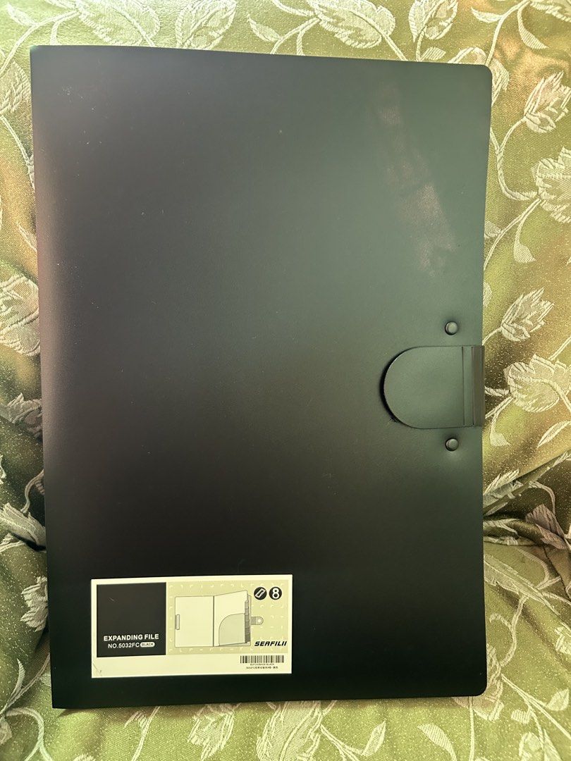 Serfilii Expanding File Folder Black No.5032FC (Category: Stationery & School Supplies) located in Tuguegarao City. Submitted by eliwyxzs (Listing ID 1470141080, Image 1). Description: - Brand: Serfilii (Model 5032FC) - Color: Sleek black - 8 expandable internal compartments with tabs for easy categorization - Built-in clipboard on the front cover for convenience - Secure elastic band closure on the right side - Ideal for school, work, or home do