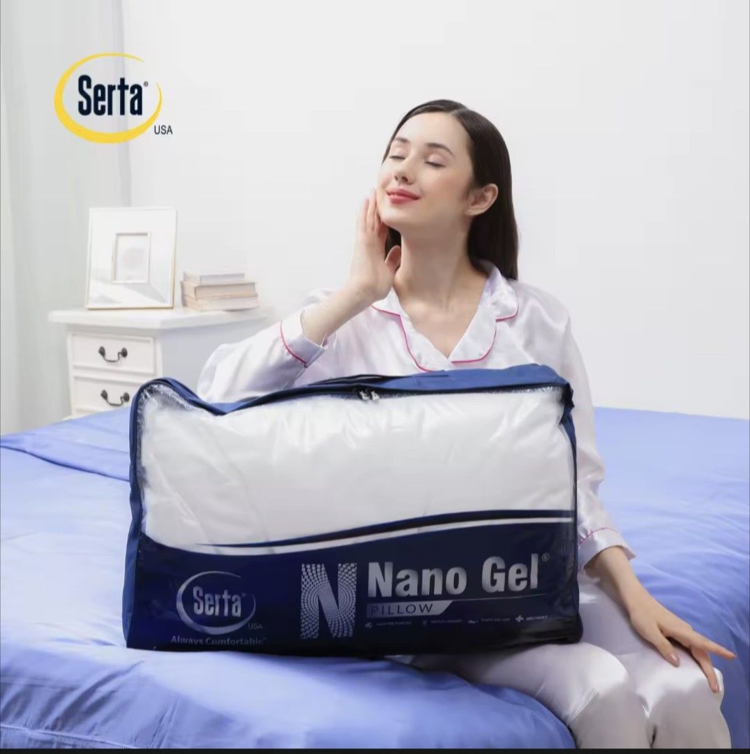 Serta Nano Gel Pillow (Category: Bedding & Towels) located in Makati City. Submitted by criamarie (Listing ID 1469973073, Image 2). Description: - Selling TWO serta Nano Gel Pillow Firm - Pillow size 48x73cm - Comes in original blue zippered storage bag with clear plastic front - Barely used; purchased from Blue app last Sept 7 2026 RFS - too big on bed.