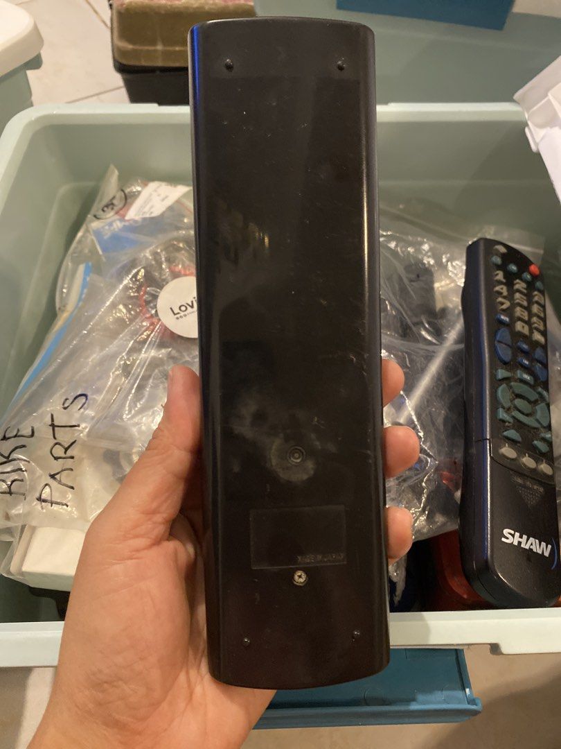 Sharp Video Cassette Recorder Remote Control (Category: Blu-Ray & Media Players) located in Muntinlupa City. Submitted by ahermosa (Listing ID 1470093537, Image 2). Description: - Authentic Black Sharp remote control for VCR - Includes standard playback, stop, pause, rewind, fast forward, and channel controls - Power button conveniently located at the top - Condition: shows dust, smudges, and scuffs from storage - Sold as-is (tested unit) - Perfe