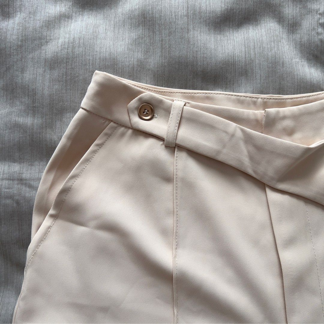 Shein Beige Tailored Shorts With Diagonal Front Strap (Category: Shorts) located in Pasig City. Submitted by jenscloset86 (Listing ID 1469965030, Image 2). Description: Size: MEDIUM • No flaws, no damages • Brand new but washed once. Measurement: Length: 18” Waist: 28”.