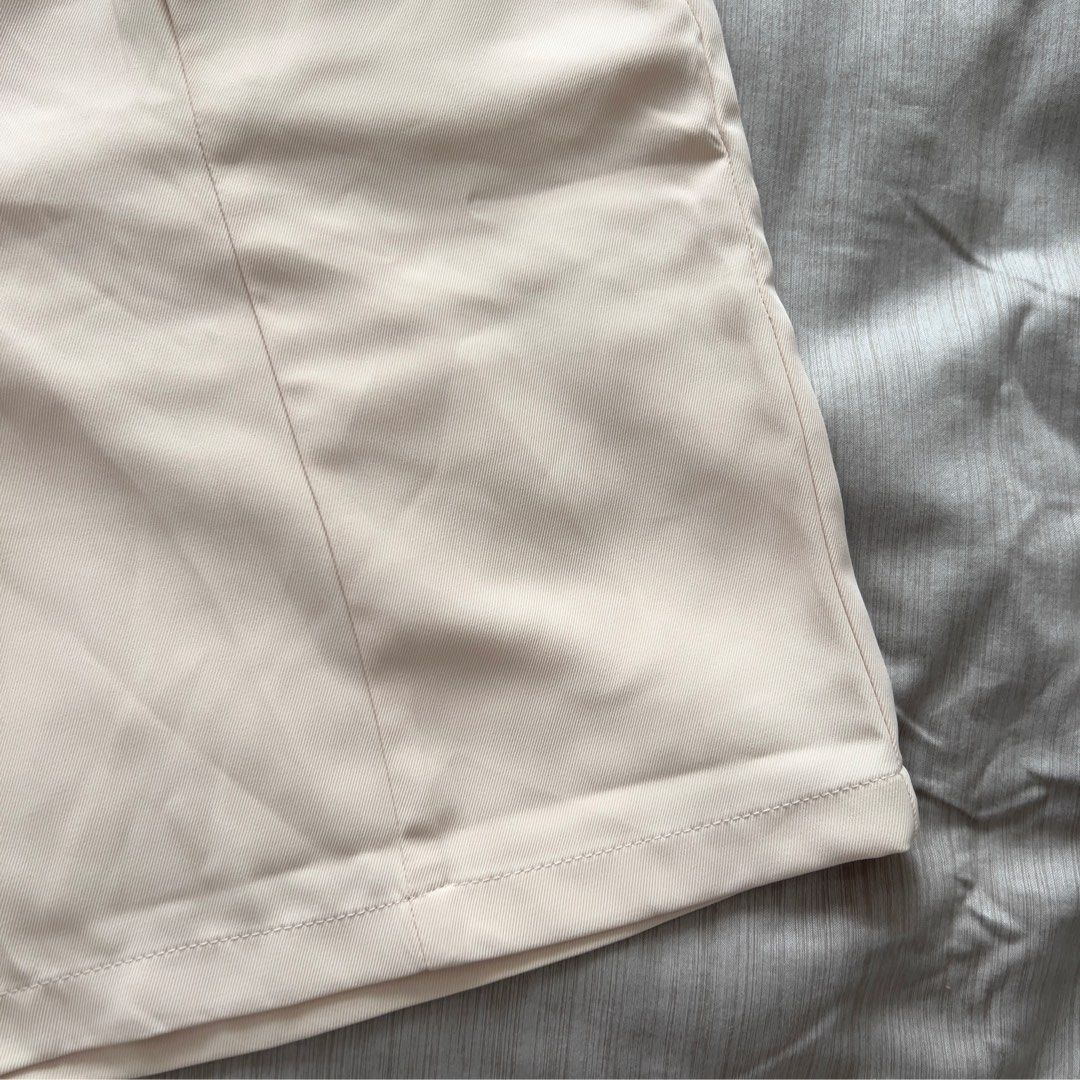 Shein Beige Tailored Shorts With Diagonal Front Strap (Category: Shorts) located in Pasig City. Submitted by jenscloset86 (Listing ID 1469965030, Image 3). Description: Size: MEDIUM • No flaws, no damages • Brand new but washed once. Measurement: Length: 18” Waist: 28”.