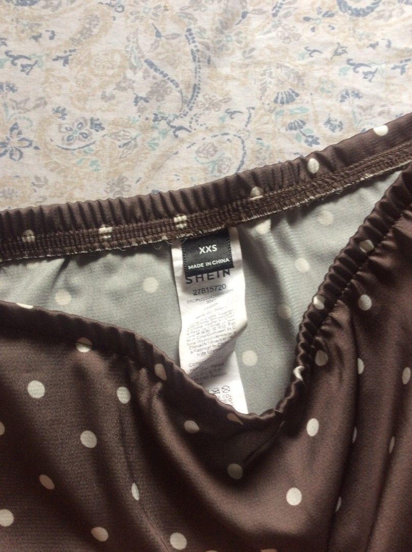 Shein Brown Polka Dot Midi Skirt (Category: Skirts) located in Manila. Submitted by shop.airens (Listing ID 1469974674, Image 2). Description: Size: XXS (fits waist 23-25 inches) Side zipper .