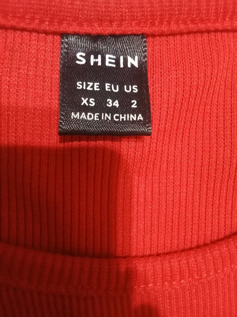 Shein Cropped Top (Category: Shirts) located in Quezon City. Submitted by wisdomsophia (Listing ID 1470047274, Image 2). Description: Ribbed Knit Cotton Top Color: Red Width: 14.5" Length: 14".