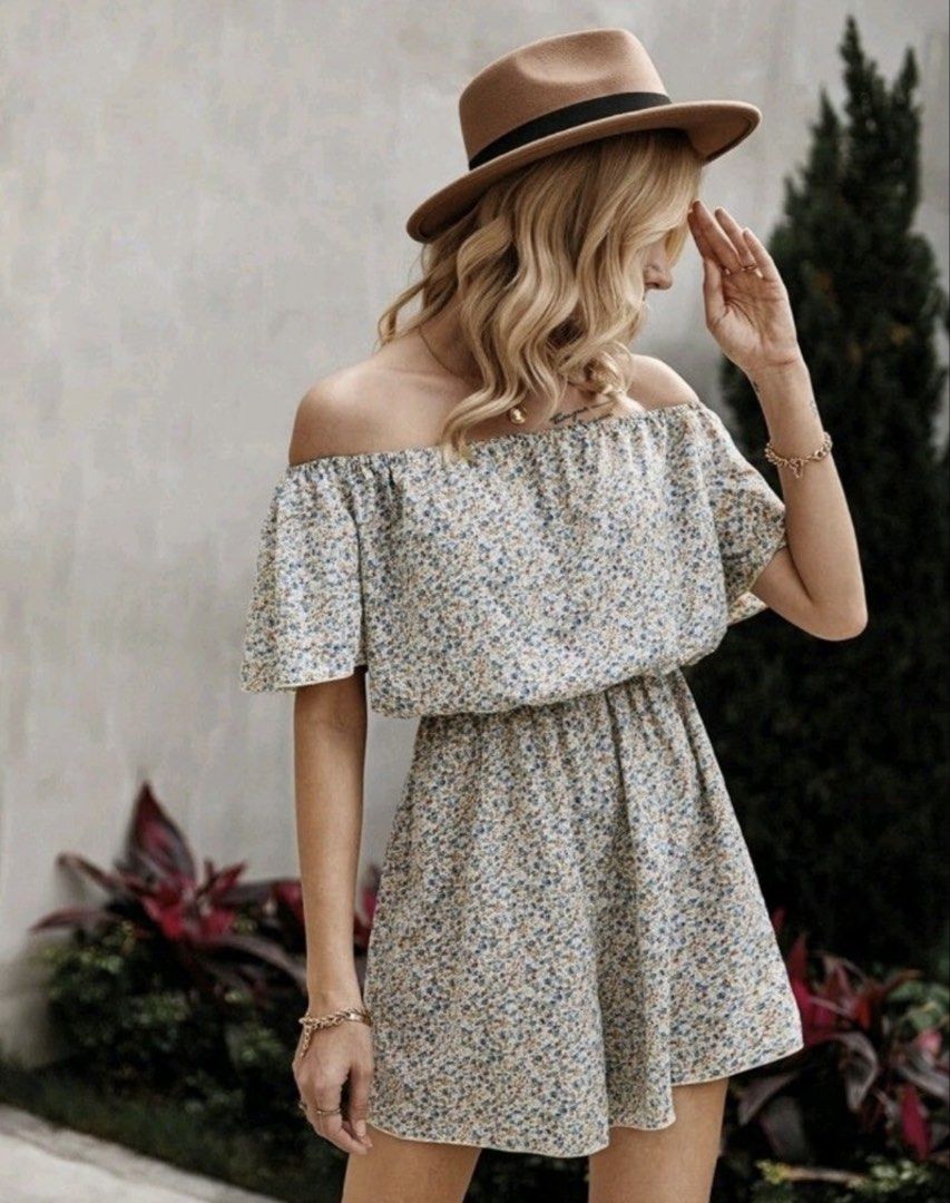 Shein Ditsy Floral Print Bardot Rompers (Category: Rompers) located in Quezon City. Submitted by turtleandfishes (Listing ID 1470101328, Image 2). Description: - Fits up to Large - Super cute blue and white floral all-over pattern - Off-shoulder design with short ruffled sleeves - Comfortable elastic waist for easy slip-on wear - Ideal for warm weather, casual days out, or vacations - Size guide with exact measurements (in inches and cm) included