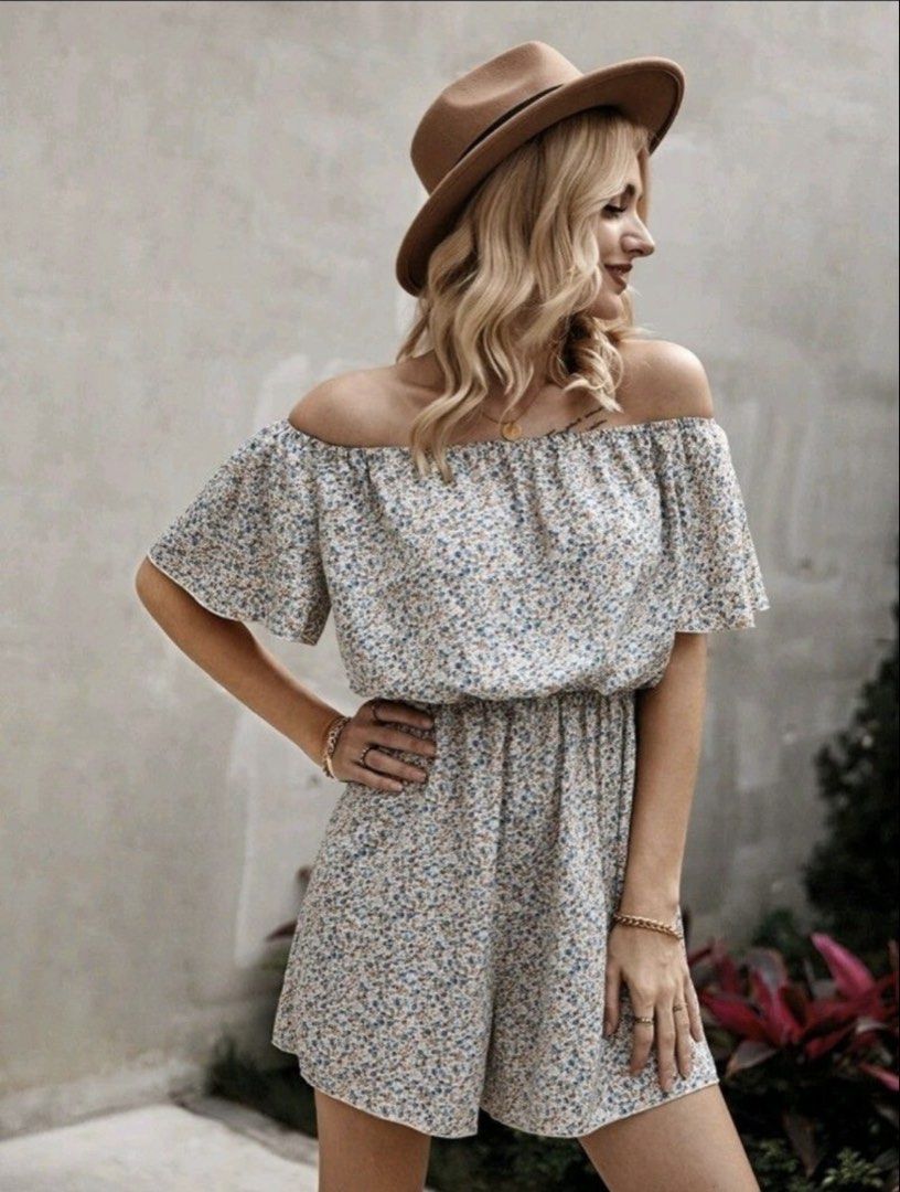 Shein Ditsy Floral Print Bardot Rompers (Category: Rompers) located in Quezon City. Submitted by turtleandfishes (Listing ID 1470101328, Image 1). Description: - Fits up to Large - Super cute blue and white floral all-over pattern - Off-shoulder design with short ruffled sleeves - Comfortable elastic waist for easy slip-on wear - Ideal for warm weather, casual days out, or vacations - Size guide with exact measurements (in inches and cm) included