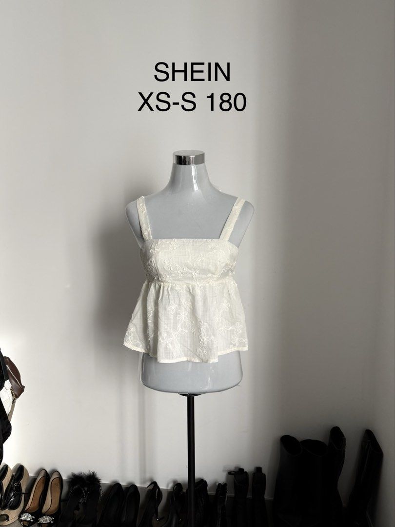 SHEIN Halter Ruched Top White XS-S (Category: Sleeveless) located in Manila. Submitted by janalulu (Listing ID 1469970254, Image 3). Description: - Brand: SHEIN - Size: Fits XS to S - Color: White - Style: Halter top with adjustable straps and flared hem - Details: All-over ruched texture with a cute front tie - Condition: Great, easy to pair with jeans or skirts for warm weather.