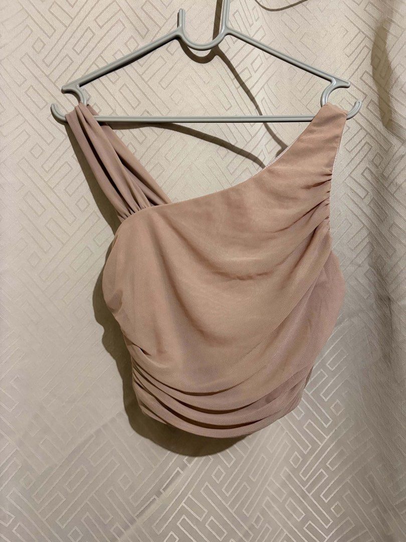 SHEIN Nude One-Shoulder Ruched Crop Top (Category: Sleeveless) located in Manila. Submitted by janellecas75114 (Listing ID 1470078927, Image 1). Description: - Brand: SHEIN - Style: Nude mesh one-shoulder crop top with all-over ruching - Size: XS (EU 34, US 2) - Material: 94% polyamide, 6% elastane (stretchy fit) - Condition: Worn twice, super cute, and in great shape.