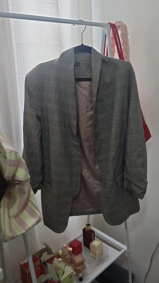 SHEIN Plaid Blazer Open Front Grey Brown (Category: Coats, Jackets and Outerwear) located in Manila. Submitted by cee_gotaway6991 (Listing ID 1469960731, Image 1). Description: - Brand: SHEIN - Style: Open front grey plaid blazer with shawl collar - Details: Rolled sleeves, front pockets, and neutral brown silky lining - Fit: Standard fit (pit-to-pit and length) - Condition: Clean, great for layering over office or casual outfits.