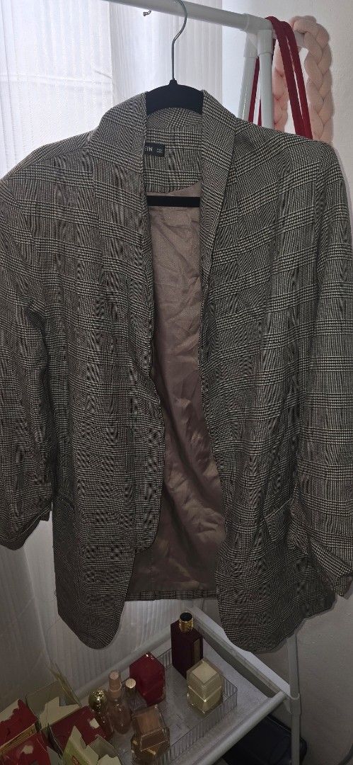 SHEIN Plaid Blazer Open Front Grey Brown (Category: Coats, Jackets and Outerwear) located in Manila. Submitted by cee_gotaway6991 (Listing ID 1469960731, Image 2). Description: - Brand: SHEIN - Style: Open front grey plaid blazer with shawl collar - Details: Rolled sleeves, front pockets, and neutral brown silky lining - Fit: Standard fit (pit-to-pit and length) - Condition: Clean, great for layering over office or casual outfits.