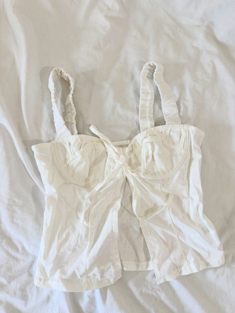 shein white tie top (Category: Sleeveless) located in Manila. Submitted by nicswhuut (Listing ID 1470117640, Image 1). Description: 📌can do lalamove (manila area only!) 📌j&t for outside manila 📌mop: gcash, maya, or metrobank 📌loc: sampaloc, manila 📌lp are posted UNLESS u r getting 2 or more items then i can give discount 🤗.